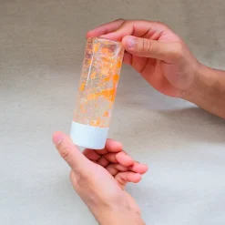 HOPTOYS Idees Cadeaux Pour Une Personne Avec Un Handicap Ou Des Troubles Moteurs*Bouteille Sensorielle Flamants Oranges