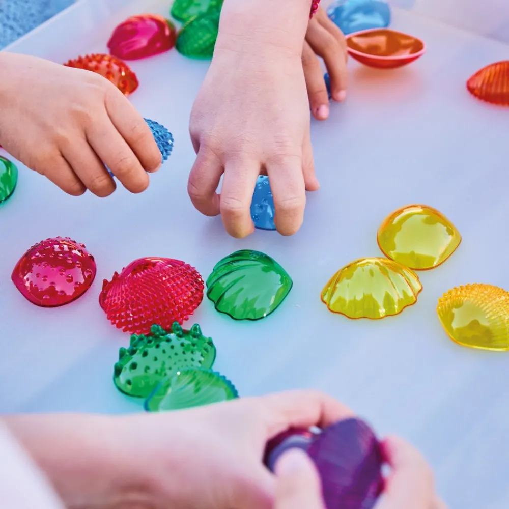 HOPTOYS Intervention Precoce*Coquillages Multicolores Tactiles Par 108